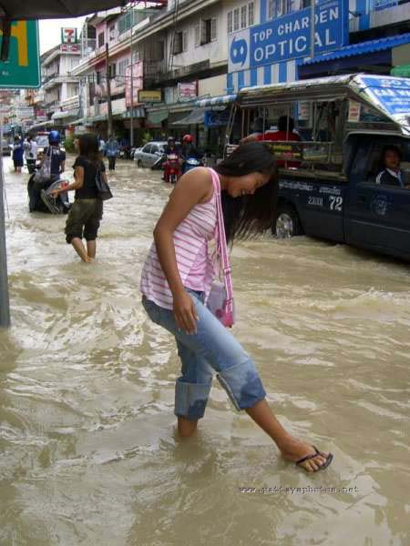 Pattaya lady and flood waters