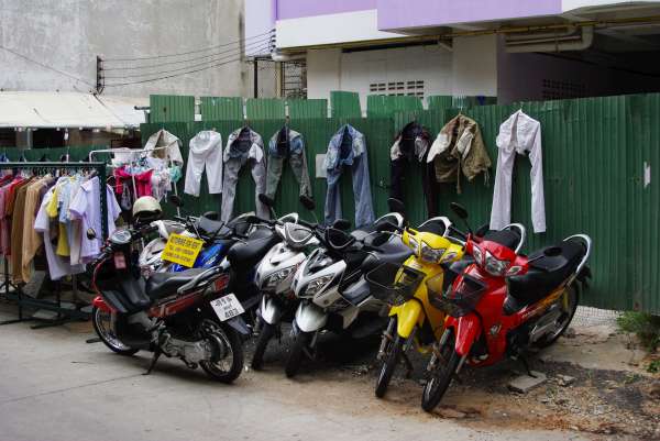 Soi Honey motor bikes and laundry